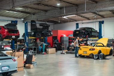 Vehicles in garage workshop