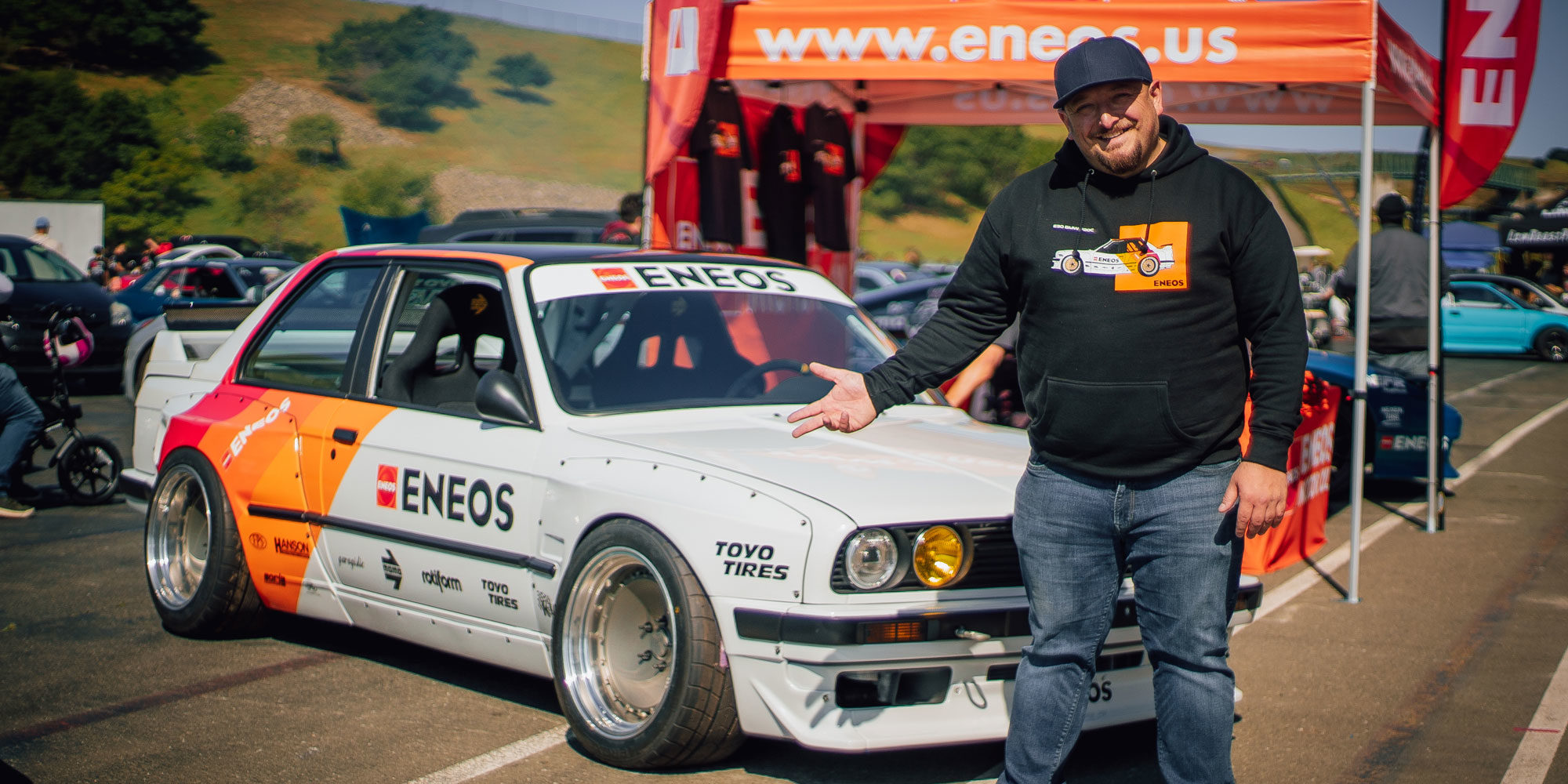 ENEOS Faruk in front of car