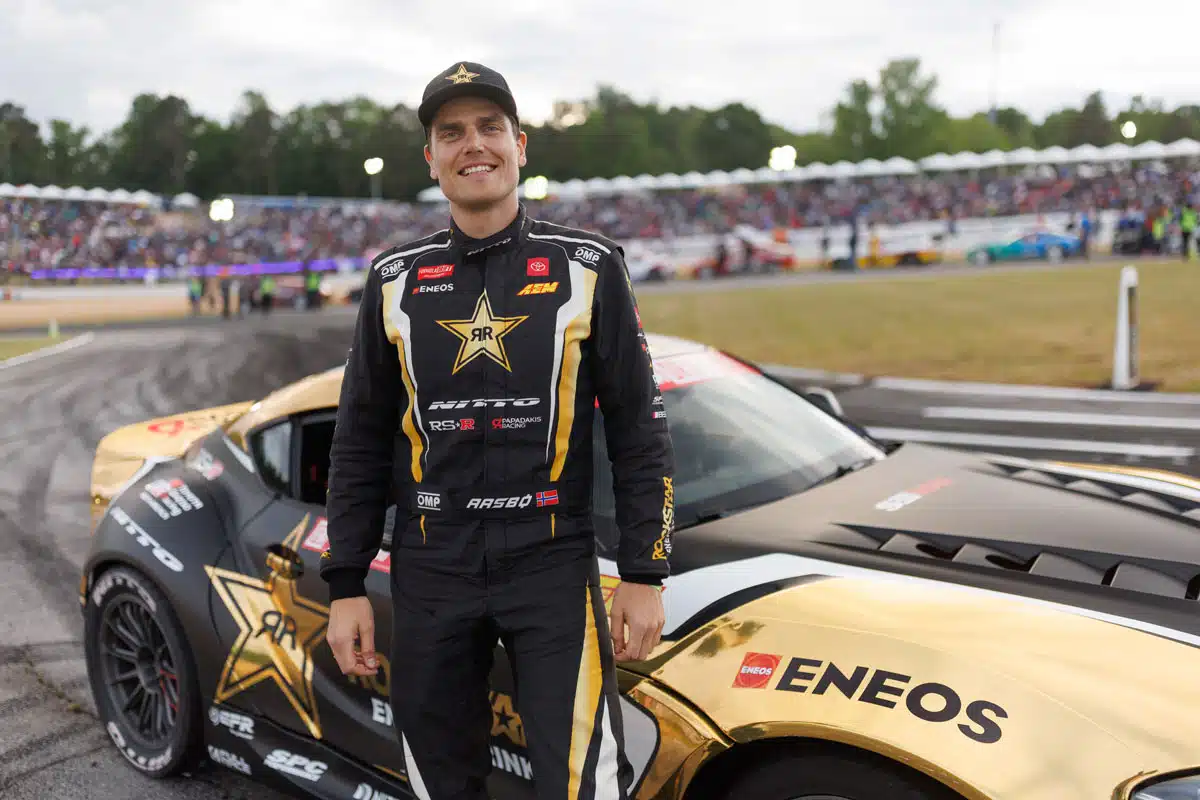 Formula Drift driver in from of Rockstar energy drink ENEOS car Formula Drift driver in from of Rockstar energy drink ENEOS car