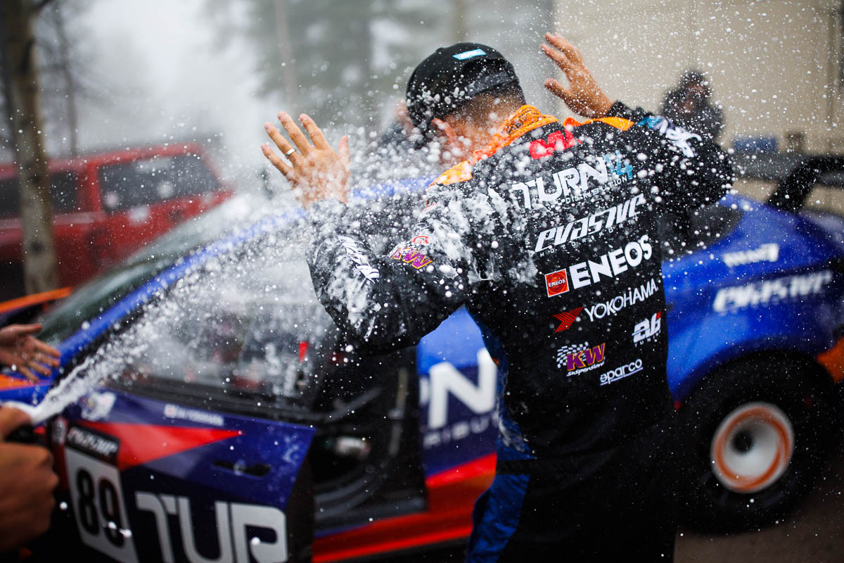 Pikes Peak driver celebrating