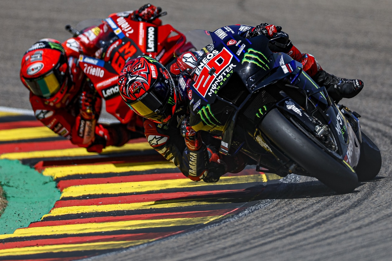 Two MotoGP riders on track