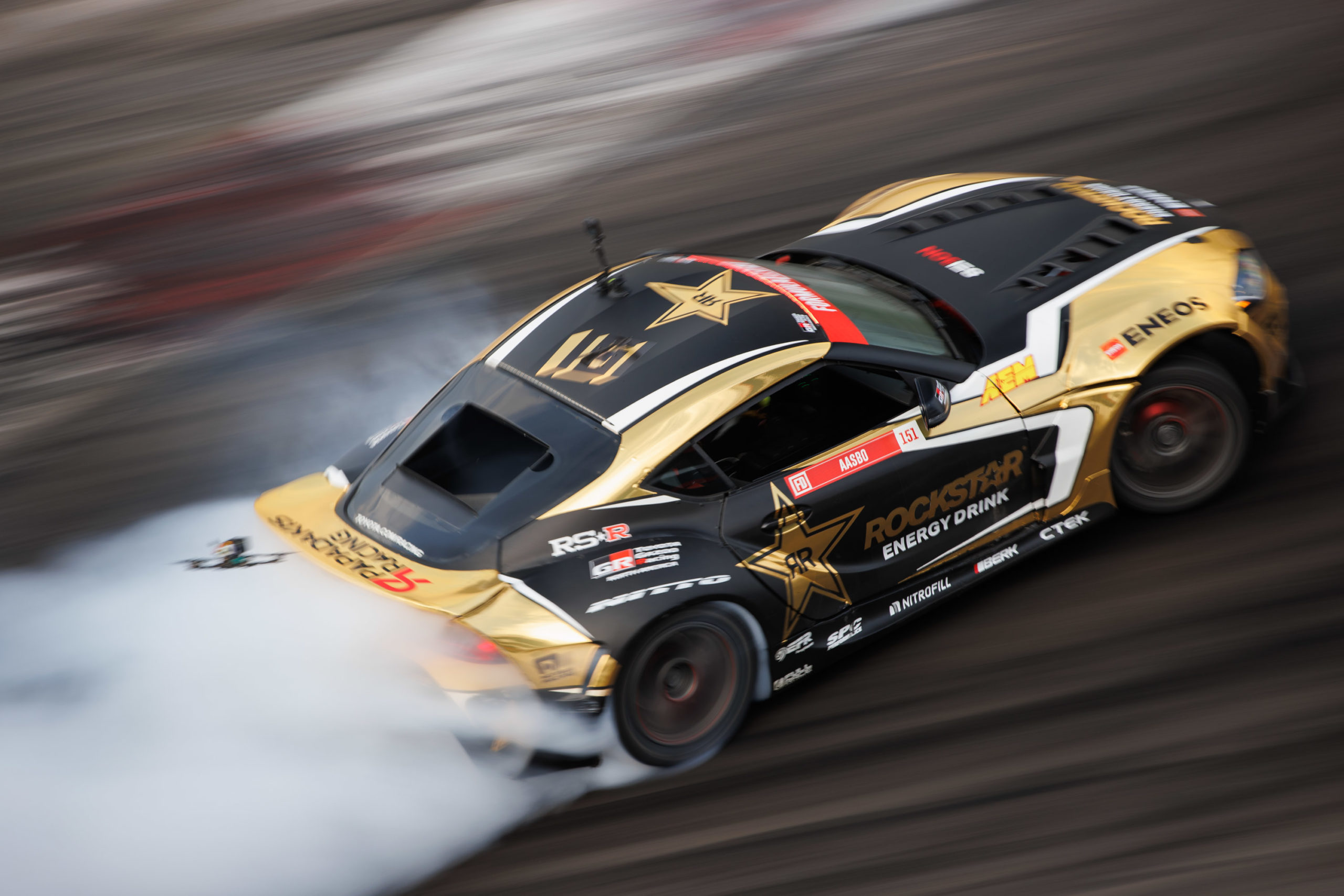 Gold ENEOS drag race car