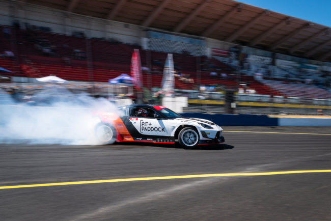 Pit+Paddock race car on track