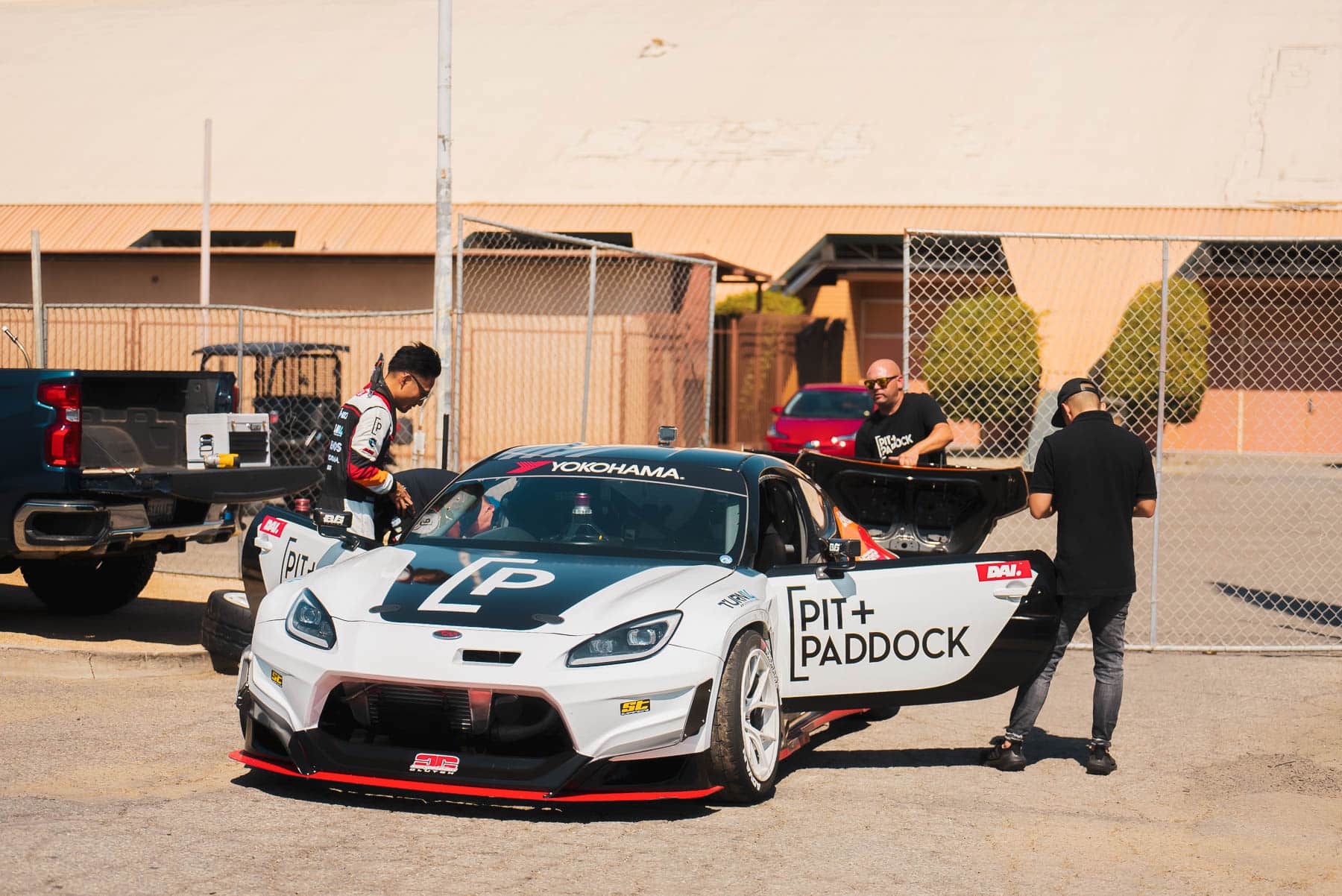 Dai entering Pit+Paddock car