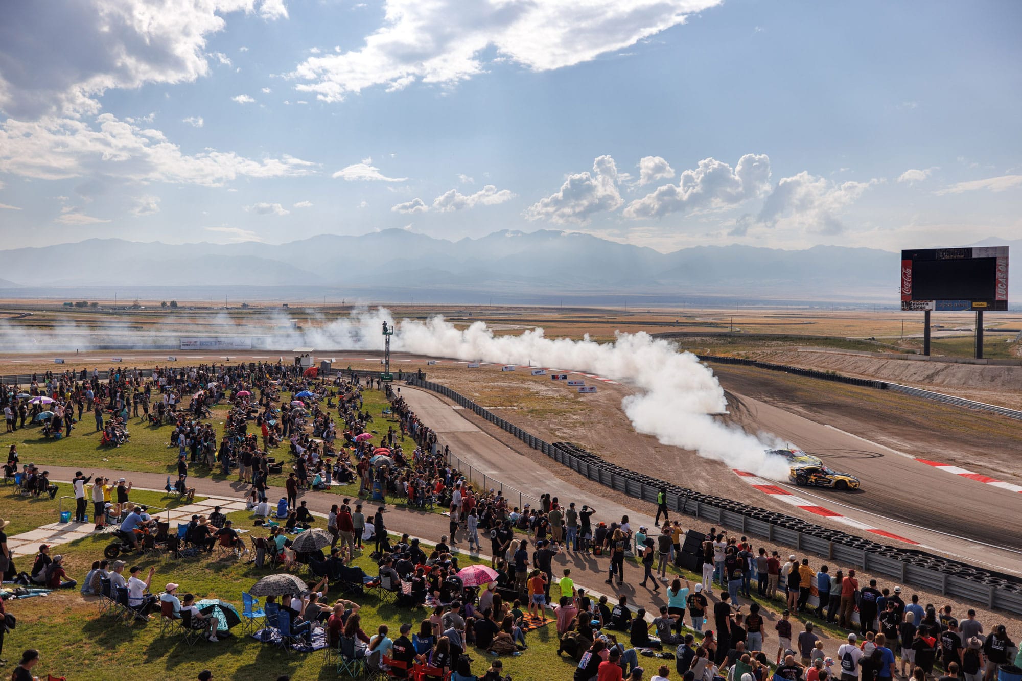 Formula Drift racers on track aerial view