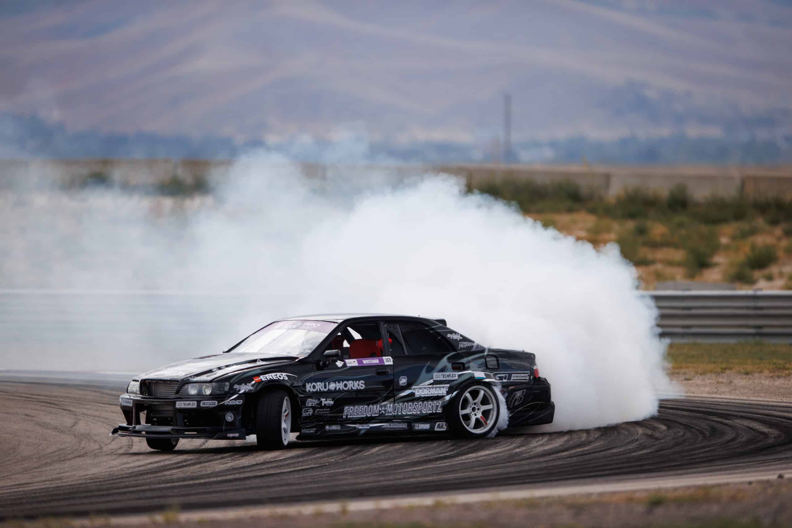 Formula Drift racer turning on track