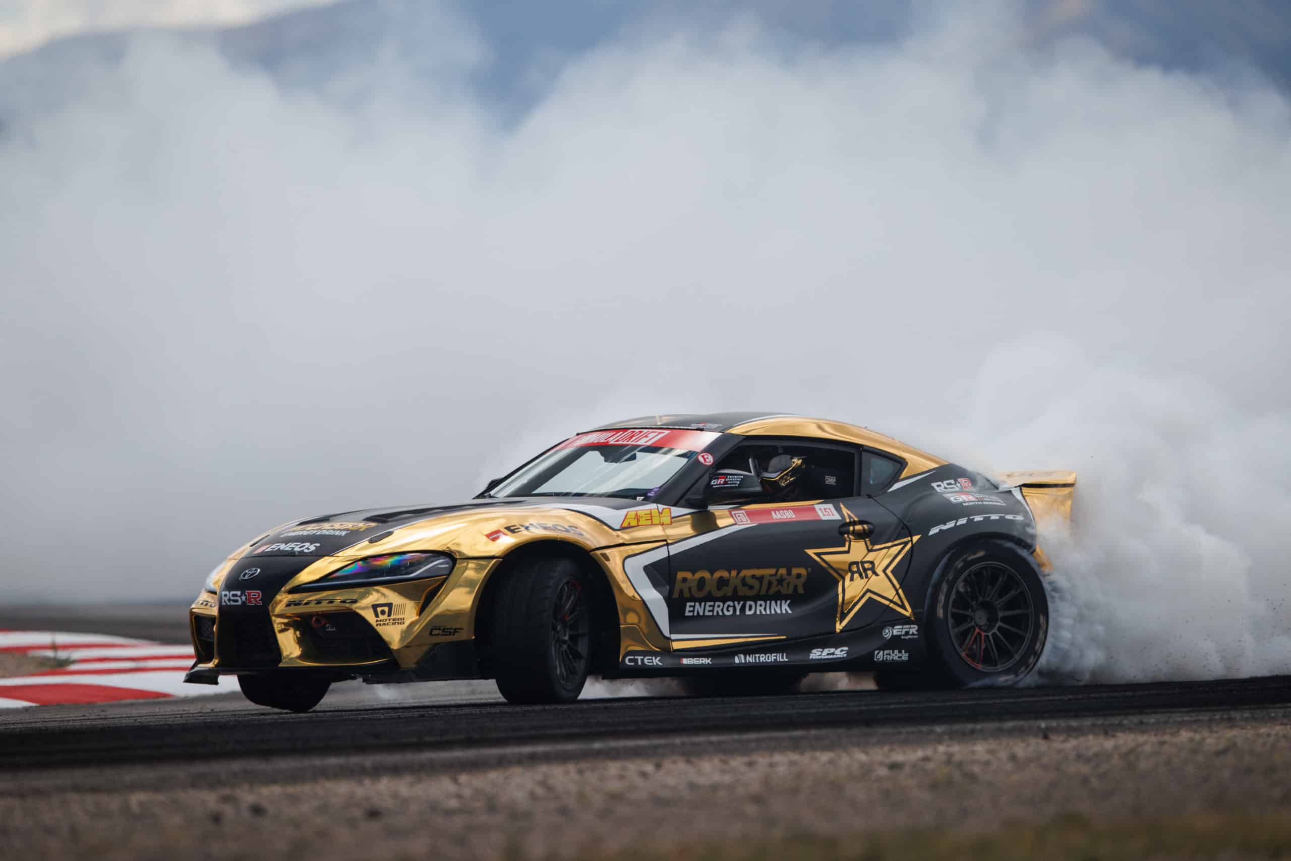 Formula Drift racer turning on track