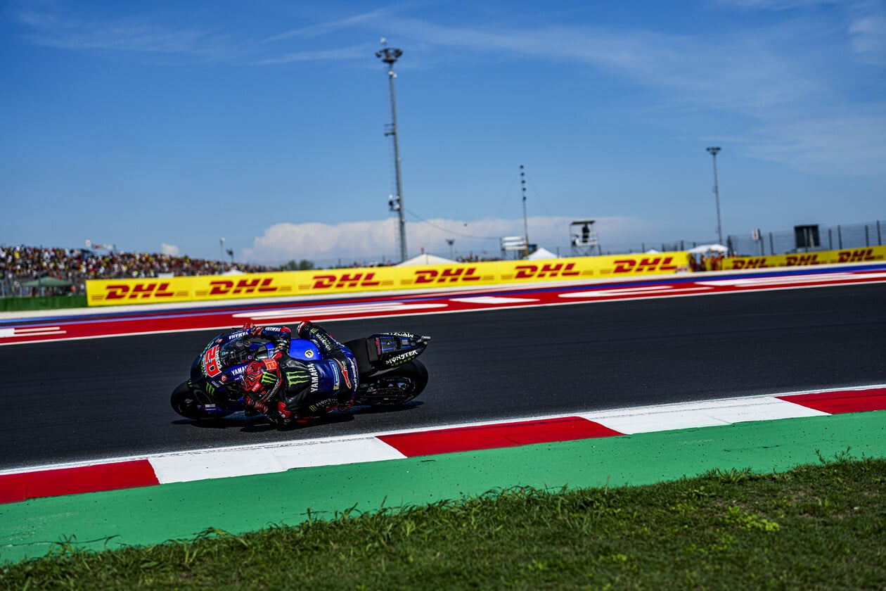 MotoGP Racers Turning on Track MotoGP Racers Turning on Track