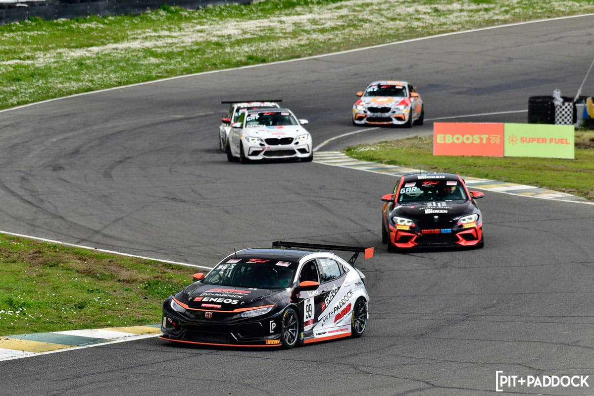 Honda Civic Type R TCX on raceway with three other cars