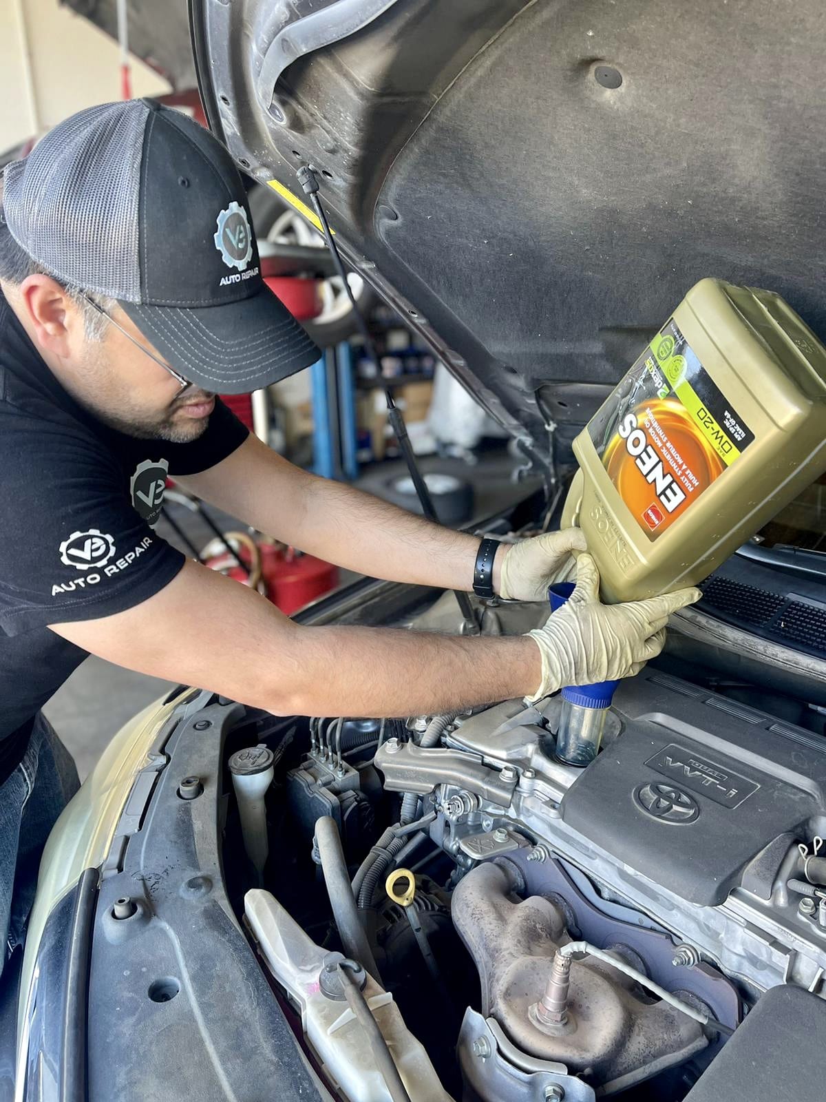V&E Auto Repair employee using ENEOS oil