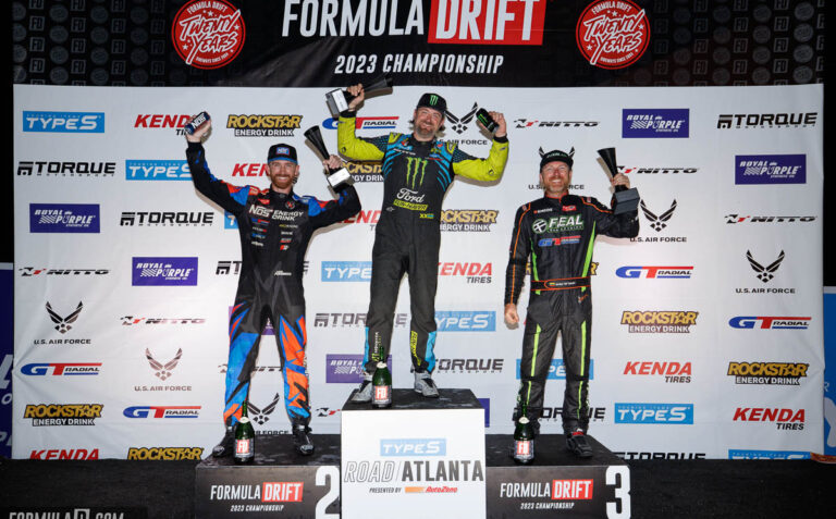 Formula DRIFT podium winners with trophies