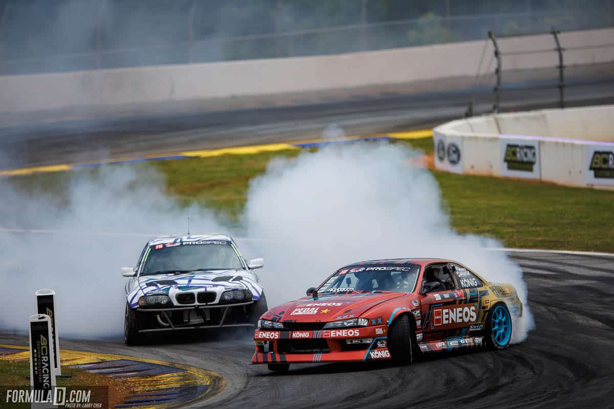 ENEOS Formula DRIFT car on track with competitor