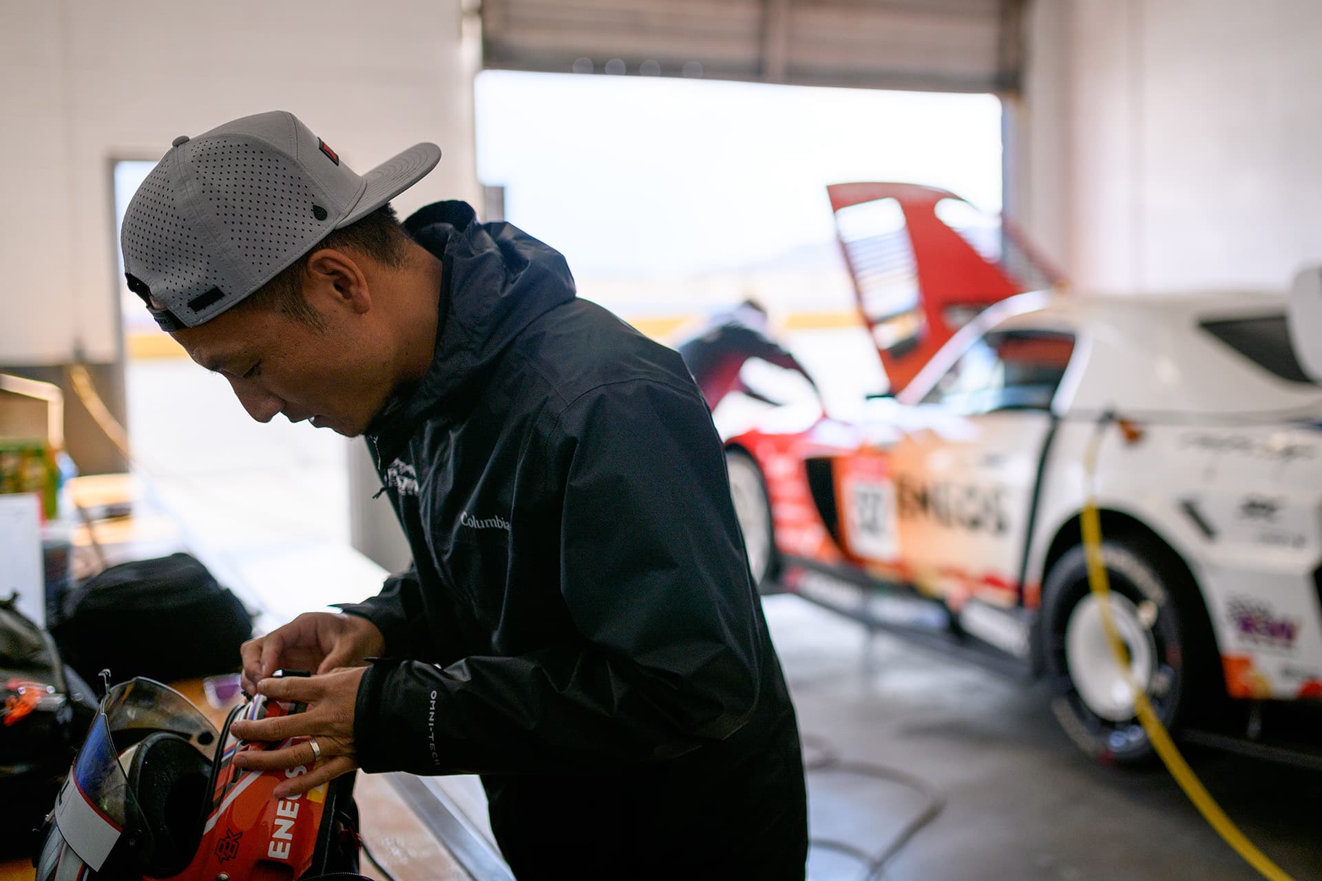 Dai Yoshihara working on the Evasive Motorsports / ENEOS Oil Honda S2000RS