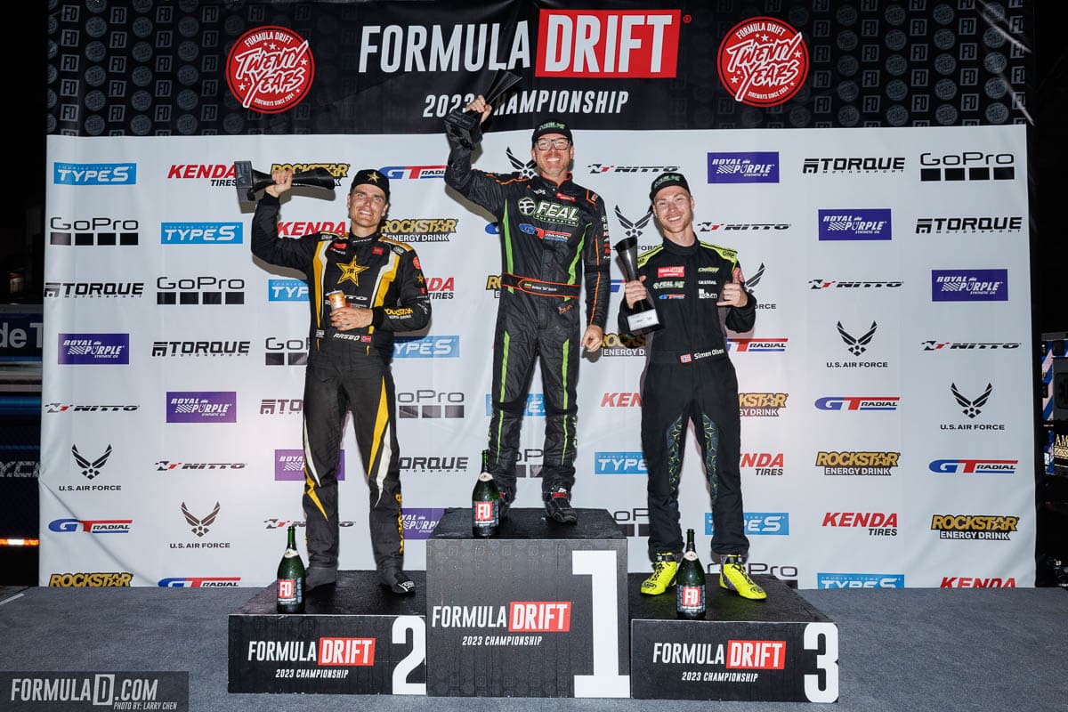 Odi Bakchis and Fredric Aasbo podium ceremony, 2023 Formula DRIFT St Louis