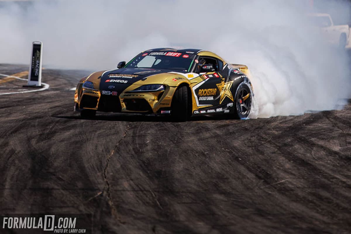 Fredric Aasbo transitions the Rockstar Energy Toyota GR Supra at Irwindale Speedway.