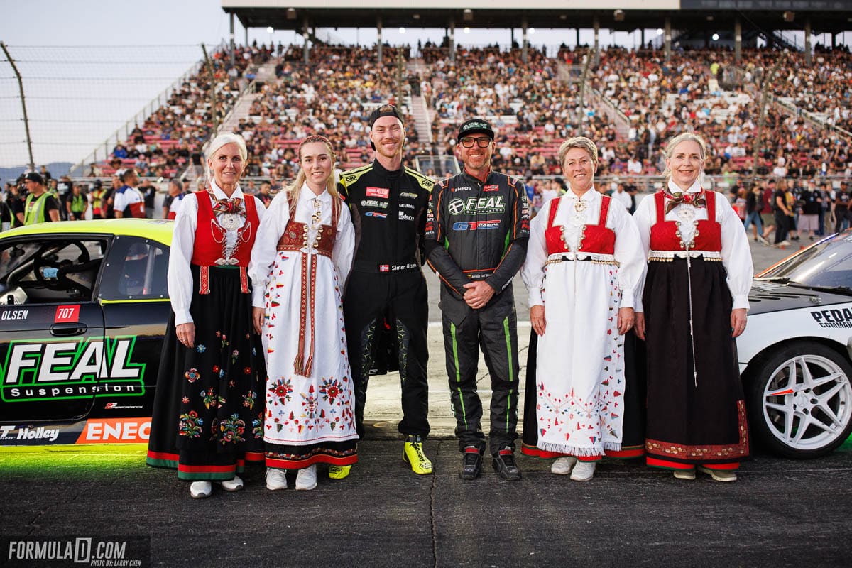 Odi Bakchis joins a Norwegian moment with Simen Olsen during the Top 16 driver introductions.