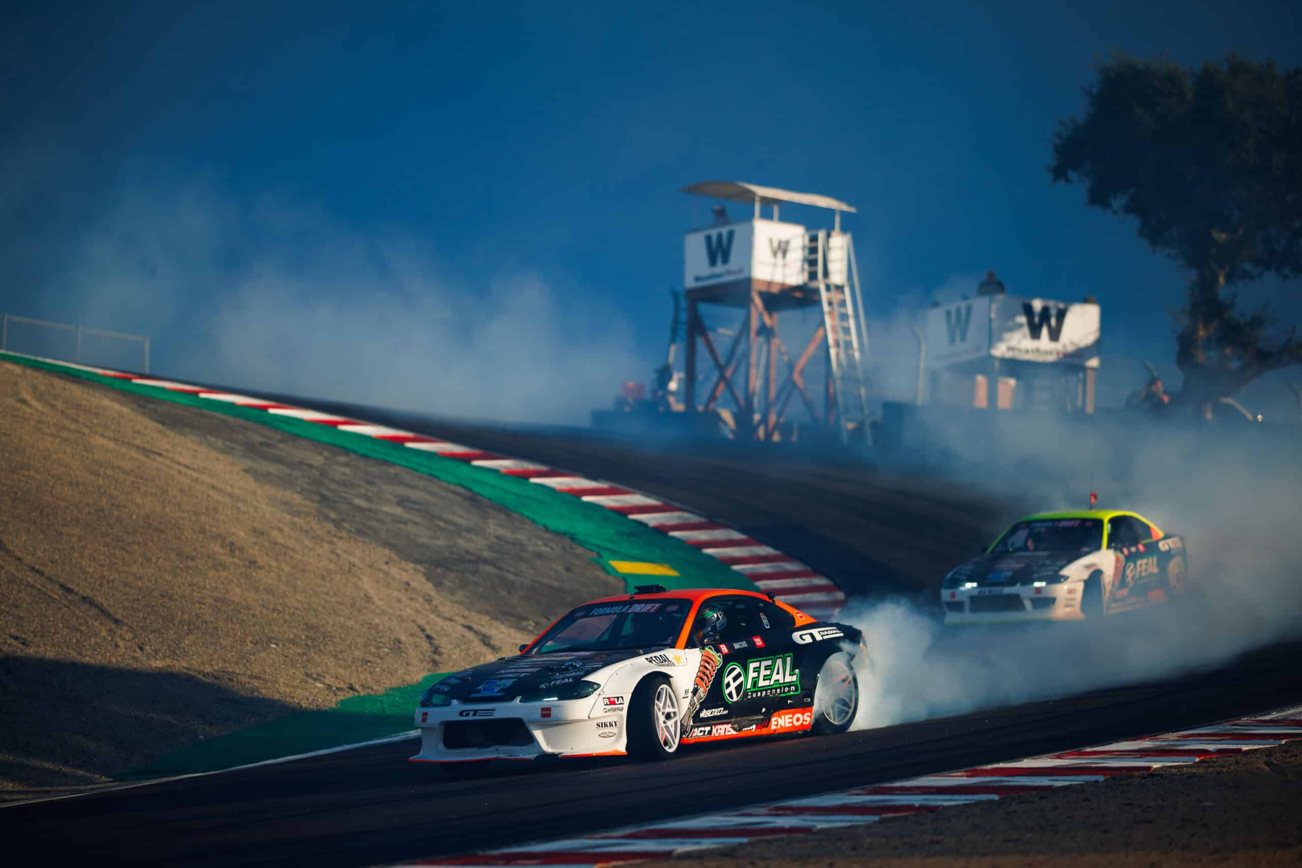 Feal Race Team smoking tires down the Laguna Seca Corkscrew.