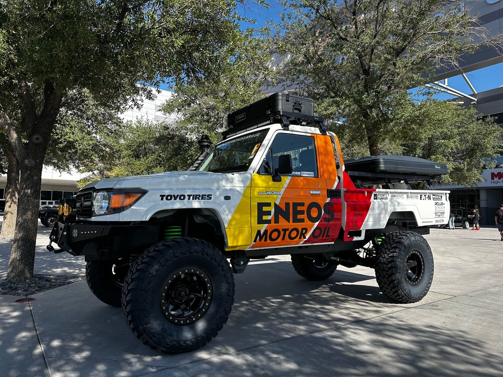 RPM Off-Road Garage Land Cruiser 70/80 Series pickup in front of Central Hall at the 2023 SEMA Show.