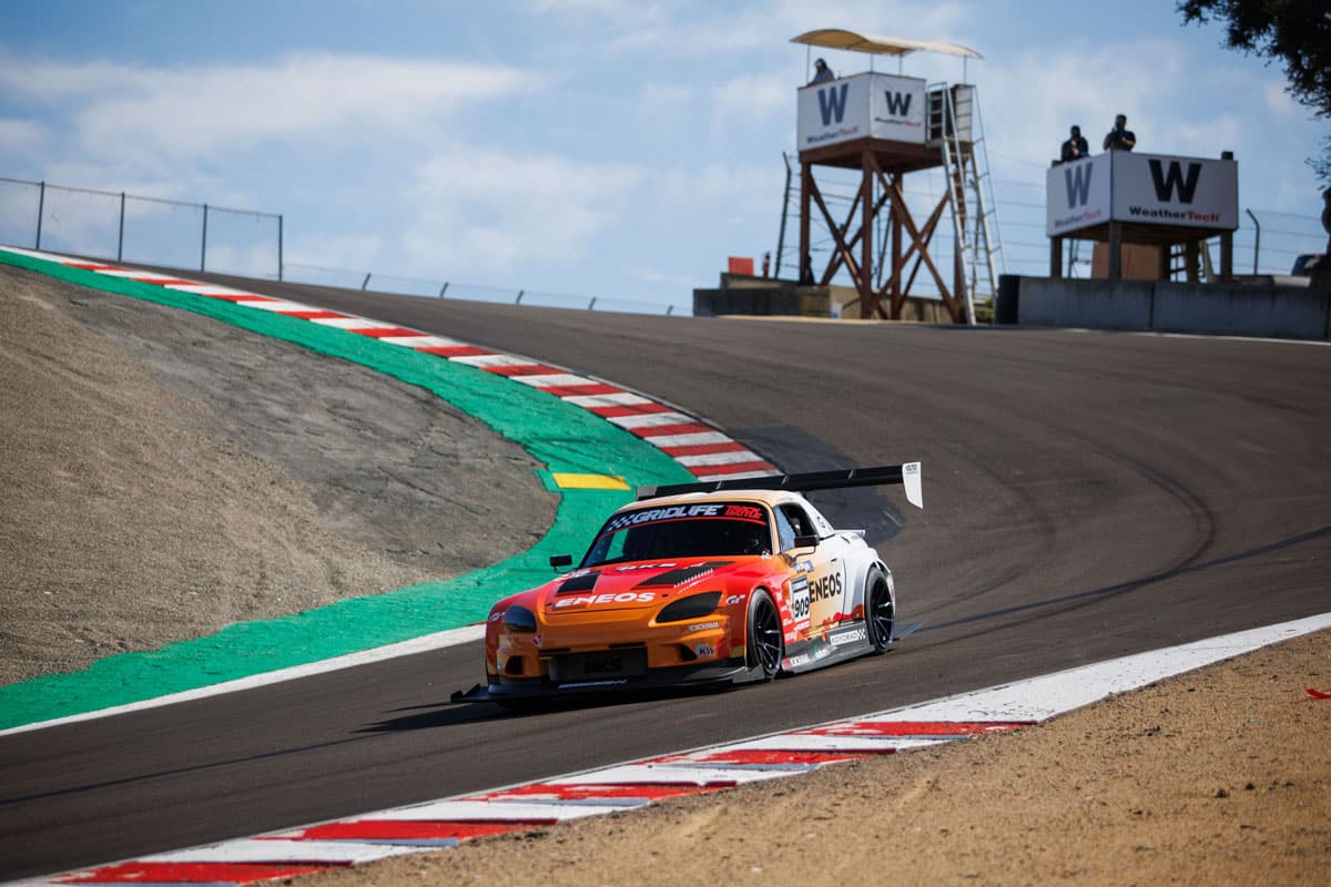 Evasive Motorsports / ENEOS Oil Honda S2000RS attacking the Corkscrew at Gridlife Laguna Seca 2023.