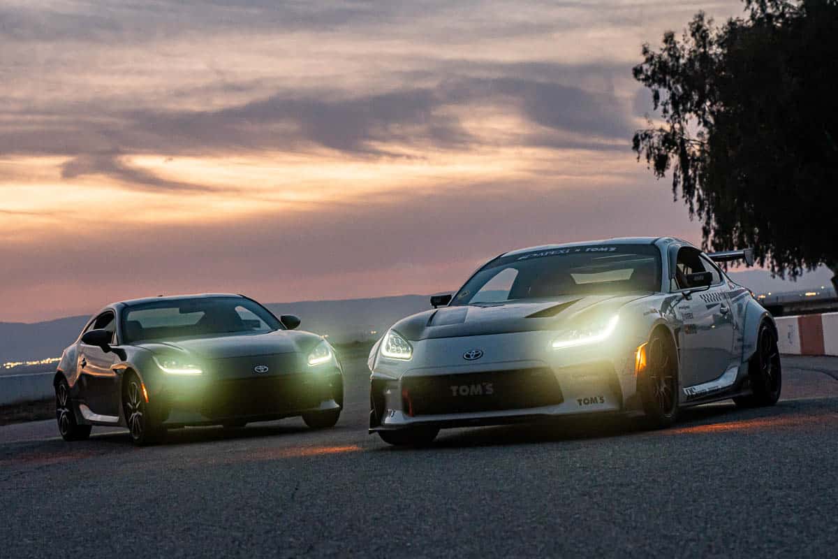 A stock GR86 paired next to the A’PEXi GR86 at the 2023 Global Time Attack Finals