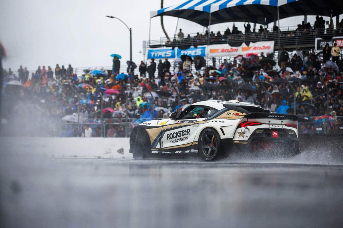 Fredric Aasbo glides through the rain in the Rockstar Energy Toyota GR Supra, 2024 Formula DRIFT Long Beach