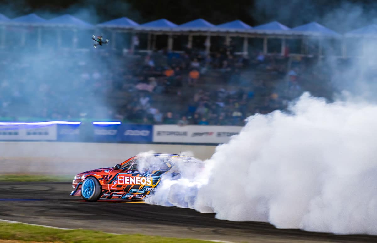 Smoke filled action provided by Faruk Kugay in the DEVSPEED / ENEOS Oil Nissan S14, 2024 Formula DRIFT Road Atlanta