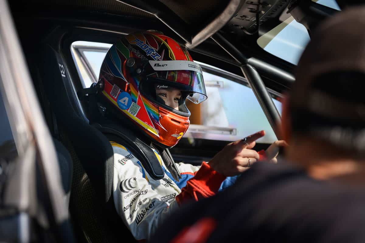 Hana Burton getting seat time with the Evasive Tesla Model 3, Super Lap Battle Finals 2024 Hana Burton getting seat time with the Evasive Tesla Model 3, Super Lap Battle Finals 2024