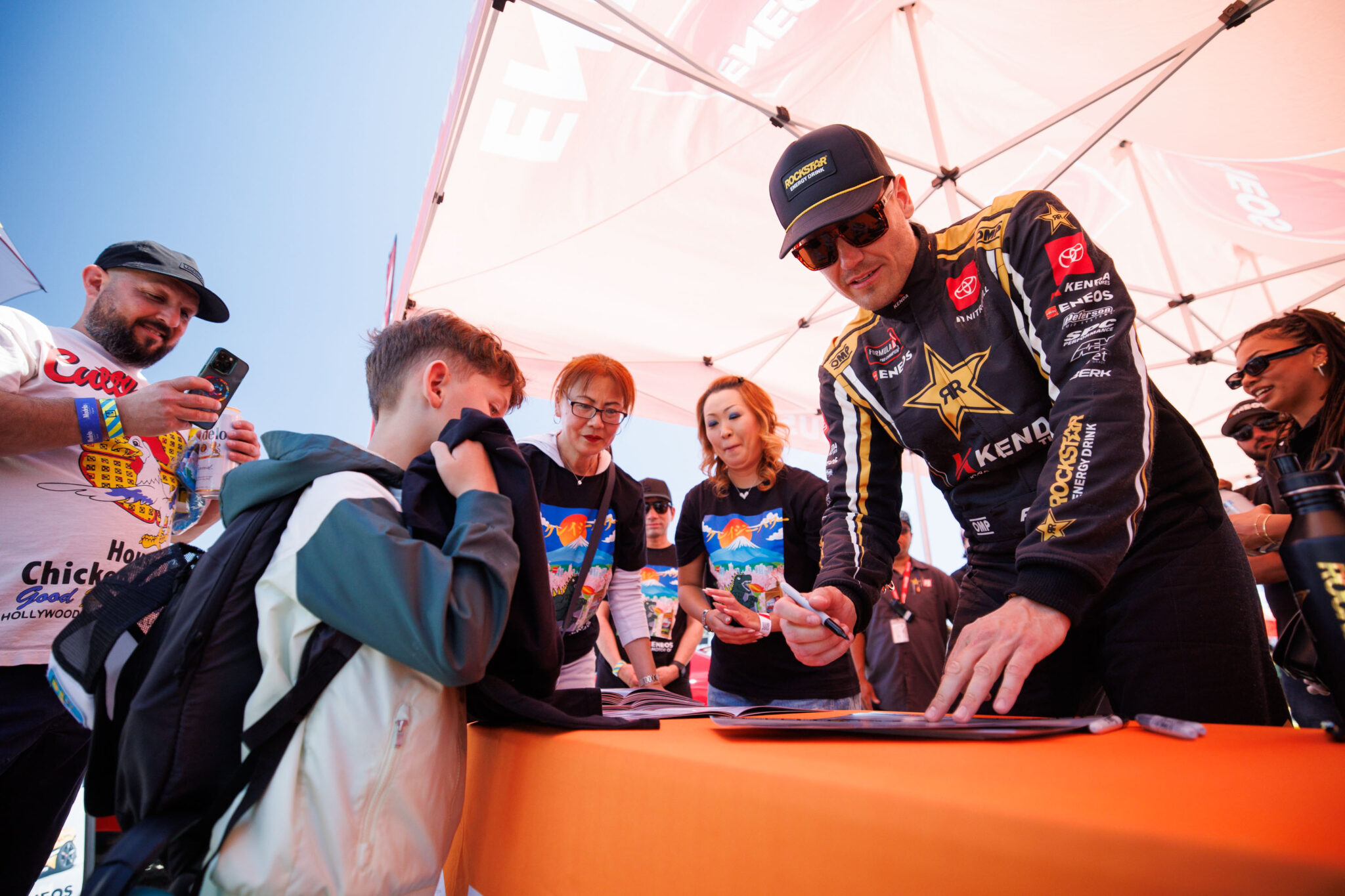 Aasbo signing autographs for ENEOS fans, 2025 Formula DRIFT Long Beach