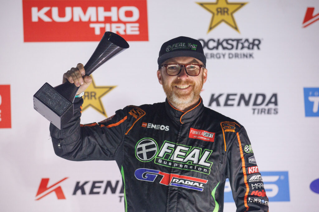 Odi Bakchis, captain of the Feal Race Team and driver of the Feal Suspension / GT Radial Nissan S14.9, secured a strong third-place finish at Road Atlanta. Bakchis, who previously achieved a Great 8 result in Long Beach, demonstrated excellent car control in the changing wet conditions, adapting his driving technique throughout the event. This podium finish elevates him to third place in the overall Championship standings with 50 points.