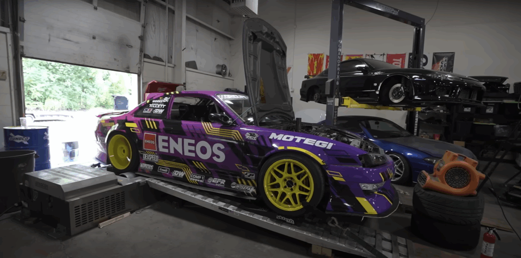 Following a rod bearing failure caused at GridLife Gingerman earlier this summer, ENEOS ambassador Faruk Kugay had the 2JZ of his ENEOS / DEVSPEED Nissan S14 rebuilt but hadn’t properly tuned it before getting ready to shred it at the recent GridLife Lime Rock event.